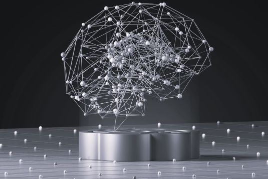 Abstraktes Bild einer Kugel aus Punkten und Linien, die miteinander verbunden sind, symbolisiert digitale Netzwerke, Technologie und Datenstrukturen. 