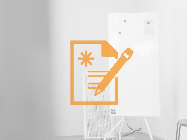 Coopers Executive Assessment Icon document with pen, in the background a bright room with flipchart.