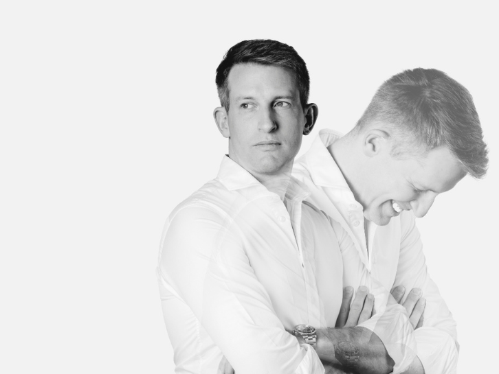 Values – Coopers Executive Man in white shirt with double exposure – one serious, one smiling.